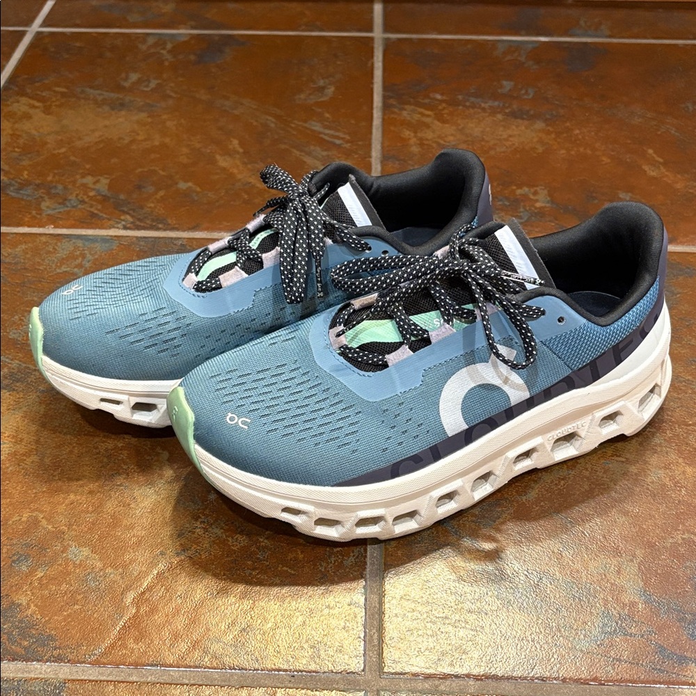 On Cloud Cloudmonster running shoes.